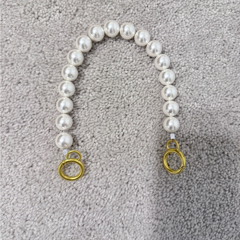 Faux pearl purse strap